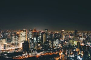 city with high rise buildings during night time